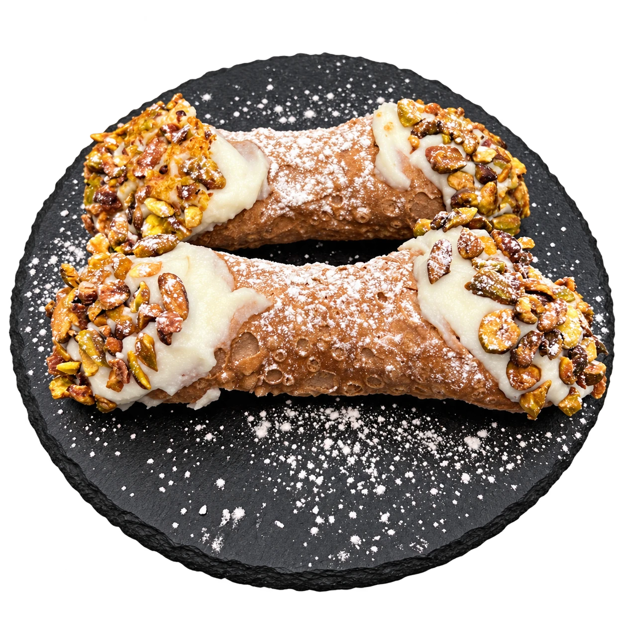 Zwei Cannoli mit Ricottafüllung und Pistazienstücken